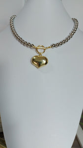 Collar corazon globo